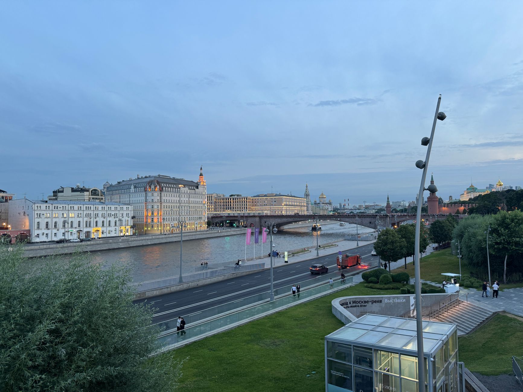 A panoramic view of a diverse Russian landscape, showing a blend of historical architectural styles under a wide sky, hinting at both European and non-European influences.