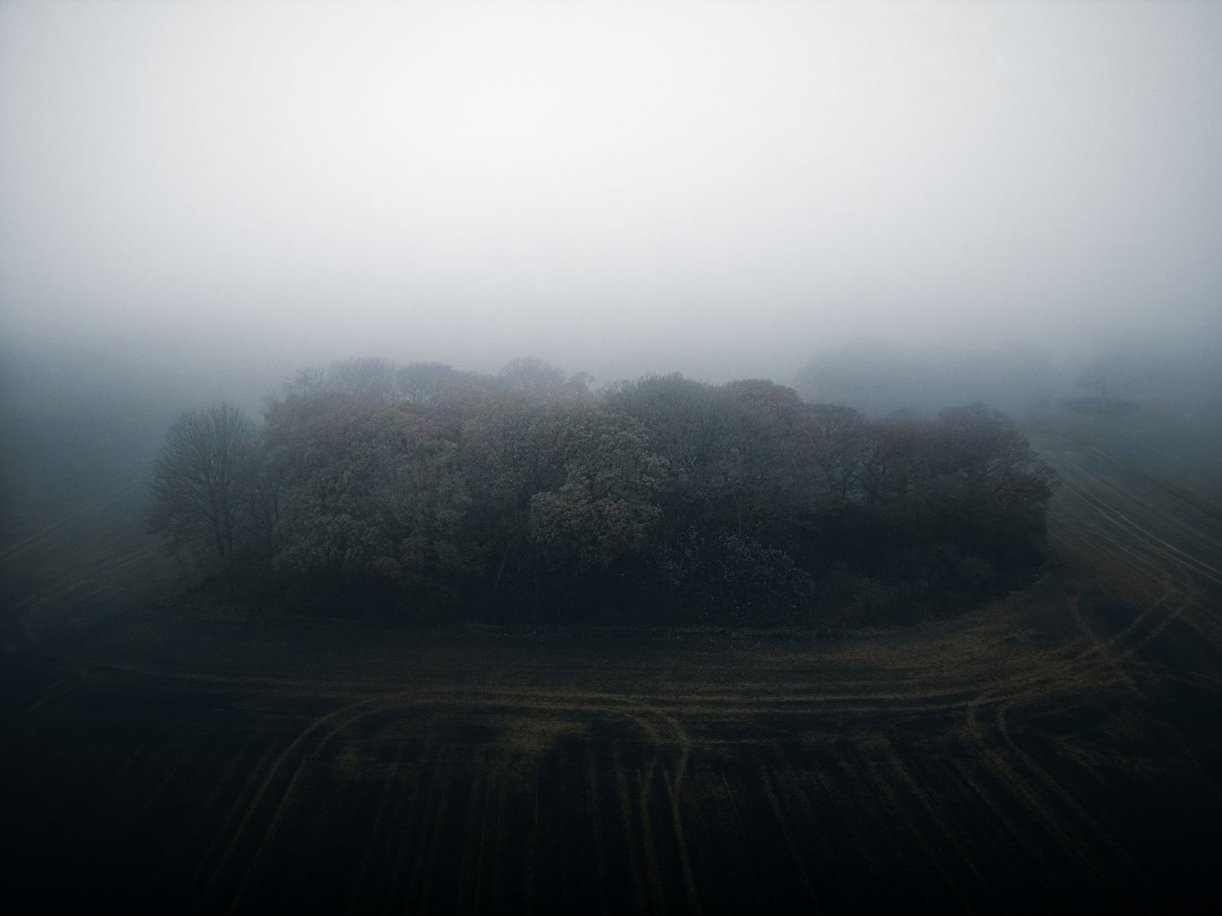 A sweeping, mysterious landscape, hinting at hidden histories and unique travel discoveries.
