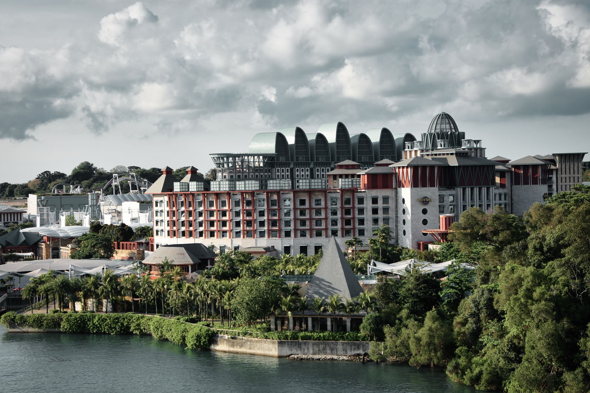 A stunning and architecturally distinctive luxury hotel set against a dramatic natural landscape, hinting at unique design and an exotic, secluded location.