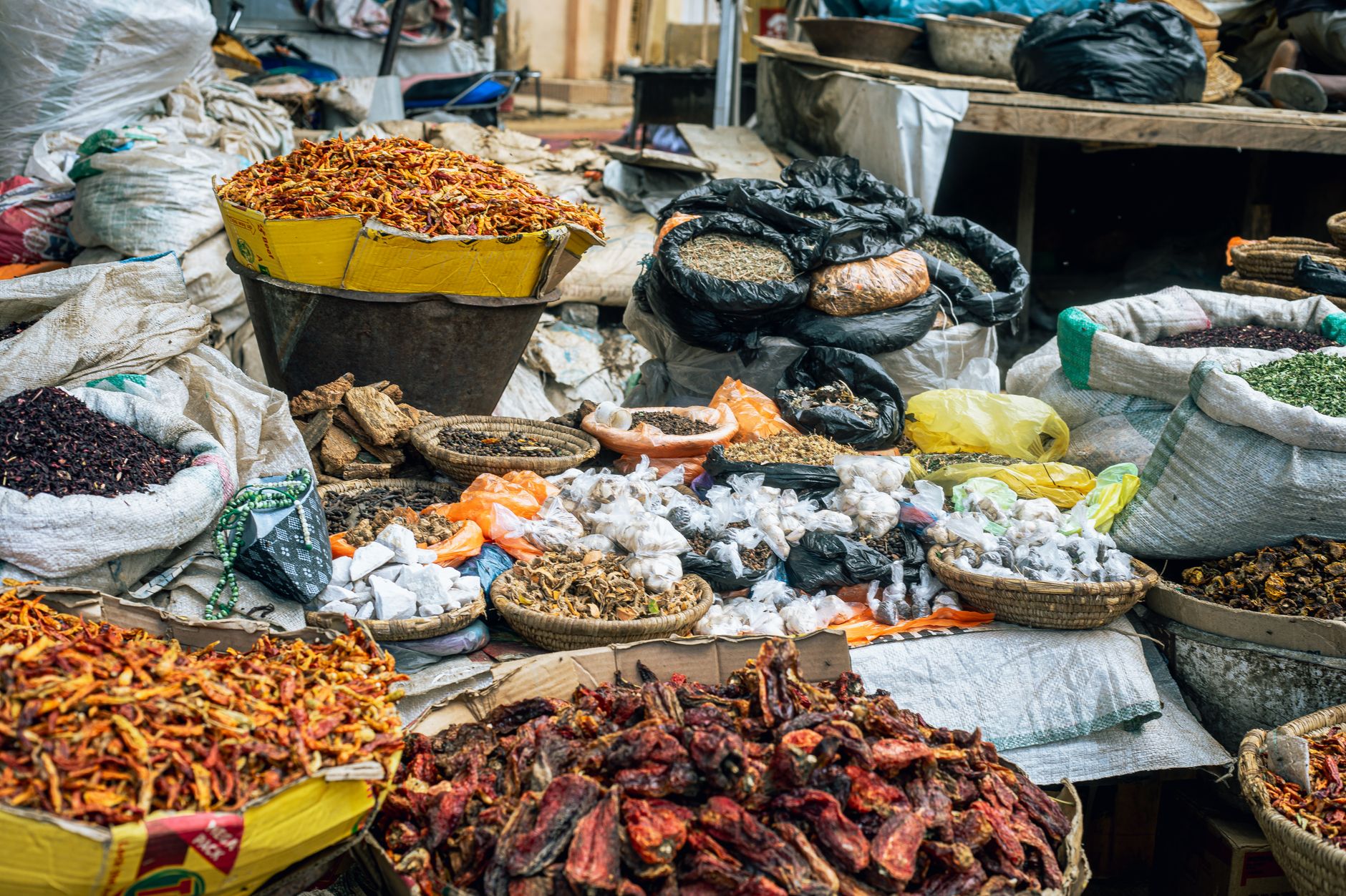A vibrant, colorful overhead view of a diverse array of international dishes and street foods, suggesting a rich tapestry of global culinary experiences.