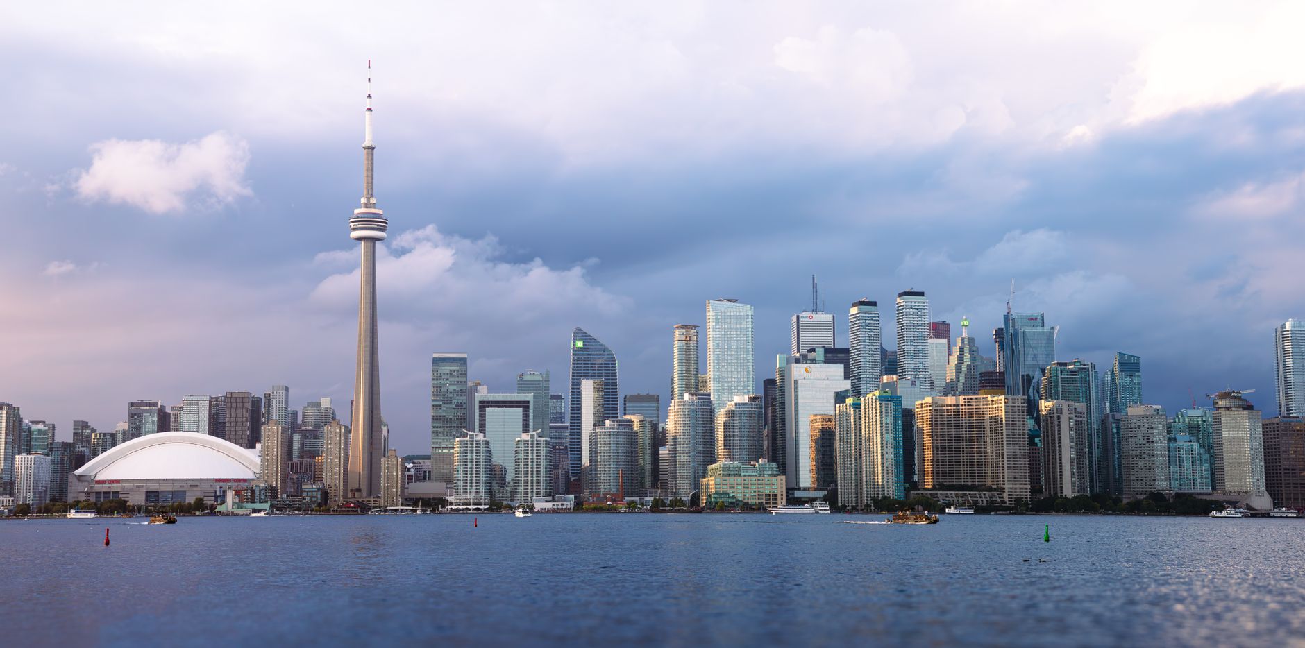 Is Toronto considered a primate city in Canada, and how does its hidden history compare?
