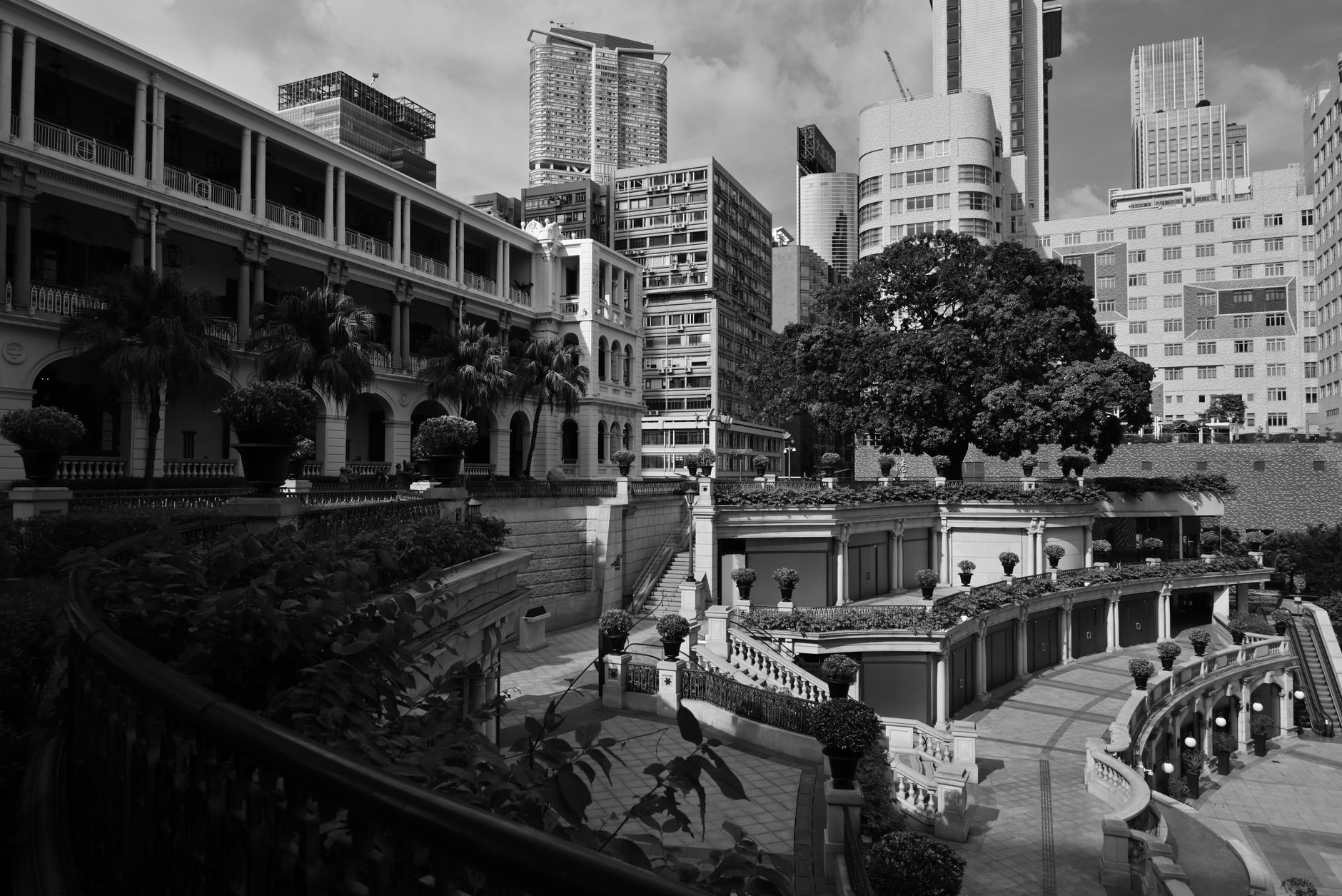 A panoramic shot blending Hong Kong's dramatic skyline with Macau's historic colonial architecture, symbolizing the unique contrasts and hidden depths of both regions.