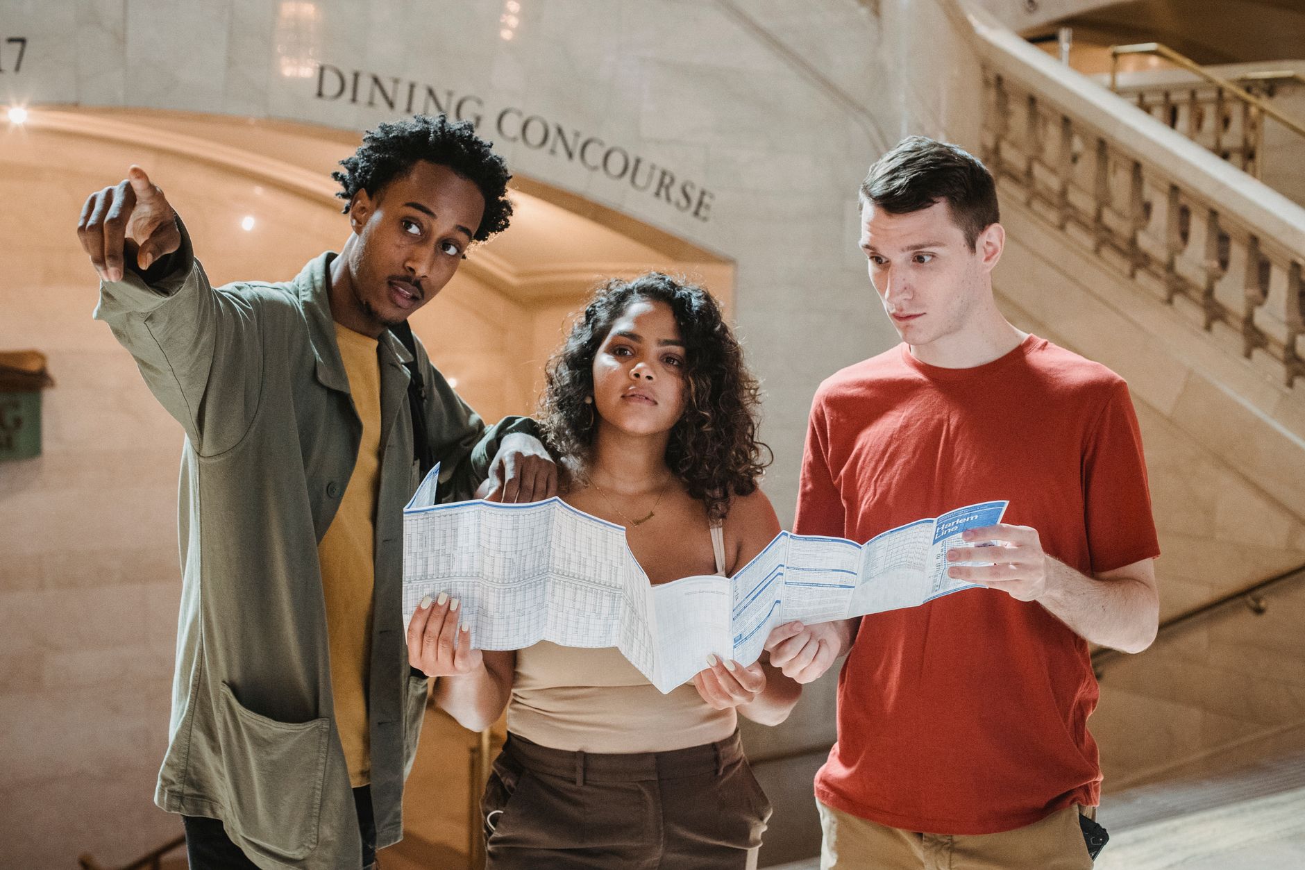 A diverse group of travelers exploring an ancient city street, bathed in warm sunlight, signifying open and inclusive journeys.