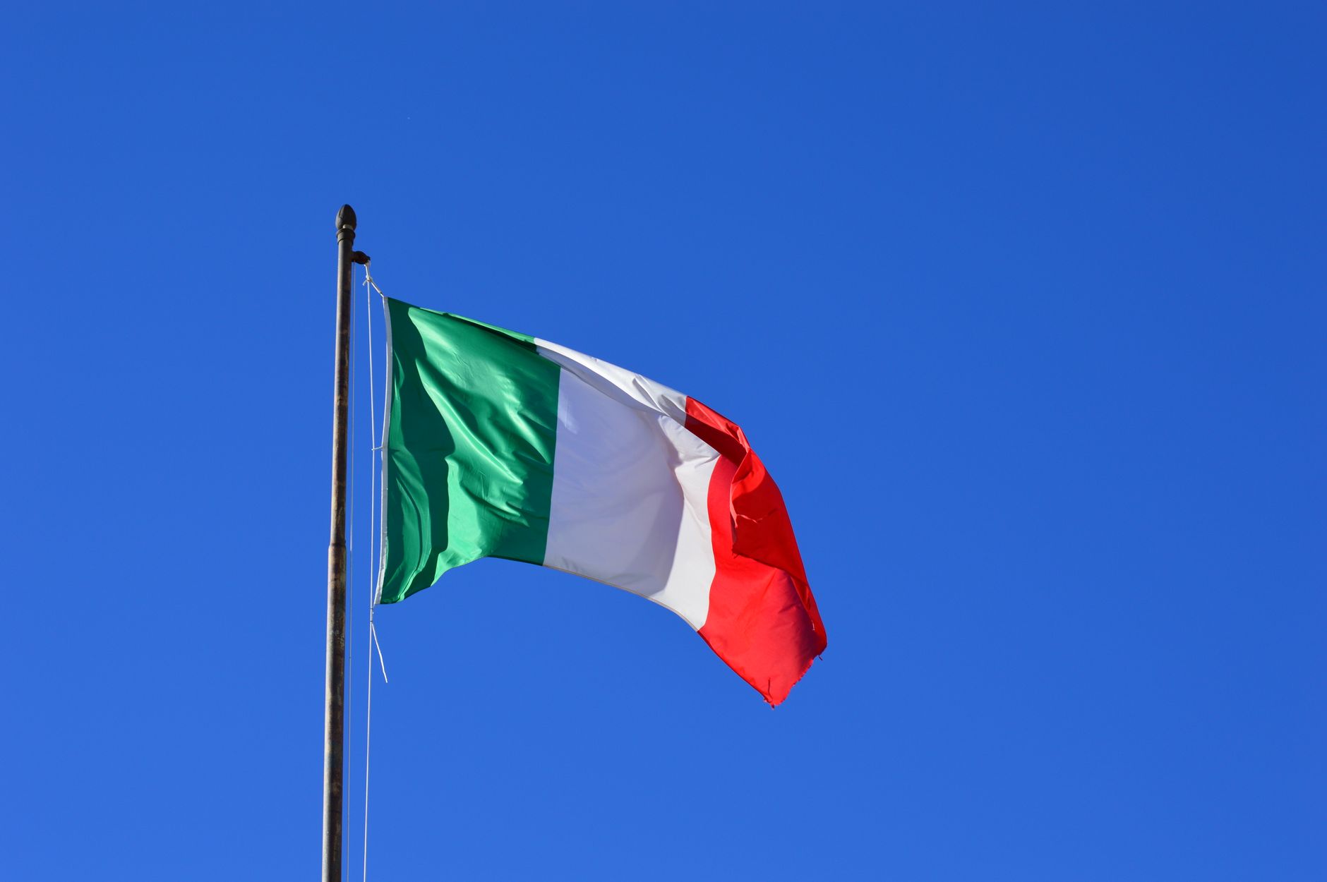 A vibrant collage representing the diverse cultures of Italy and Turkey, with elements of ancient architecture, bustling markets, and serene landscapes.