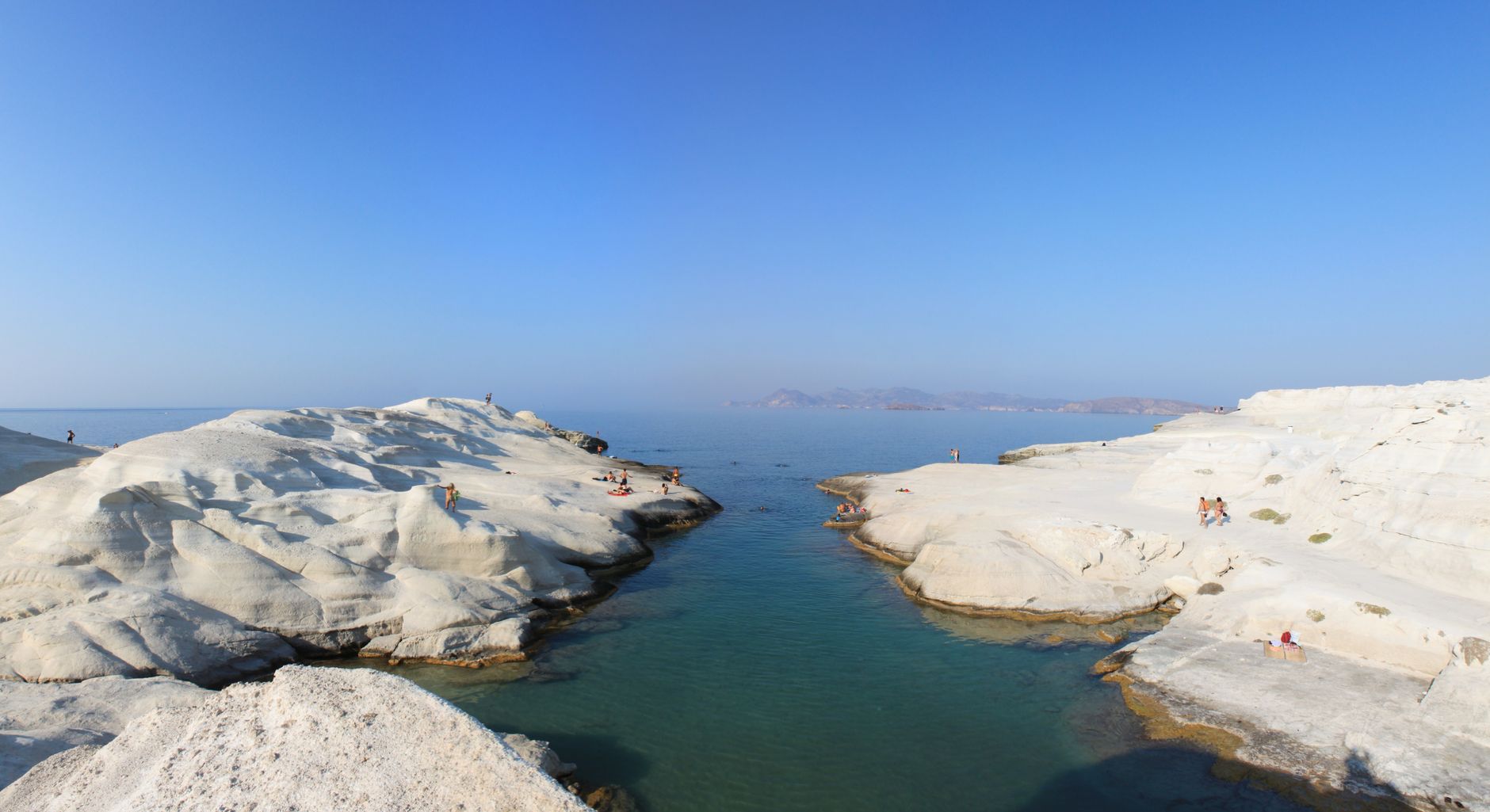 What are the unique geological features of Milos that make it extraordinary?