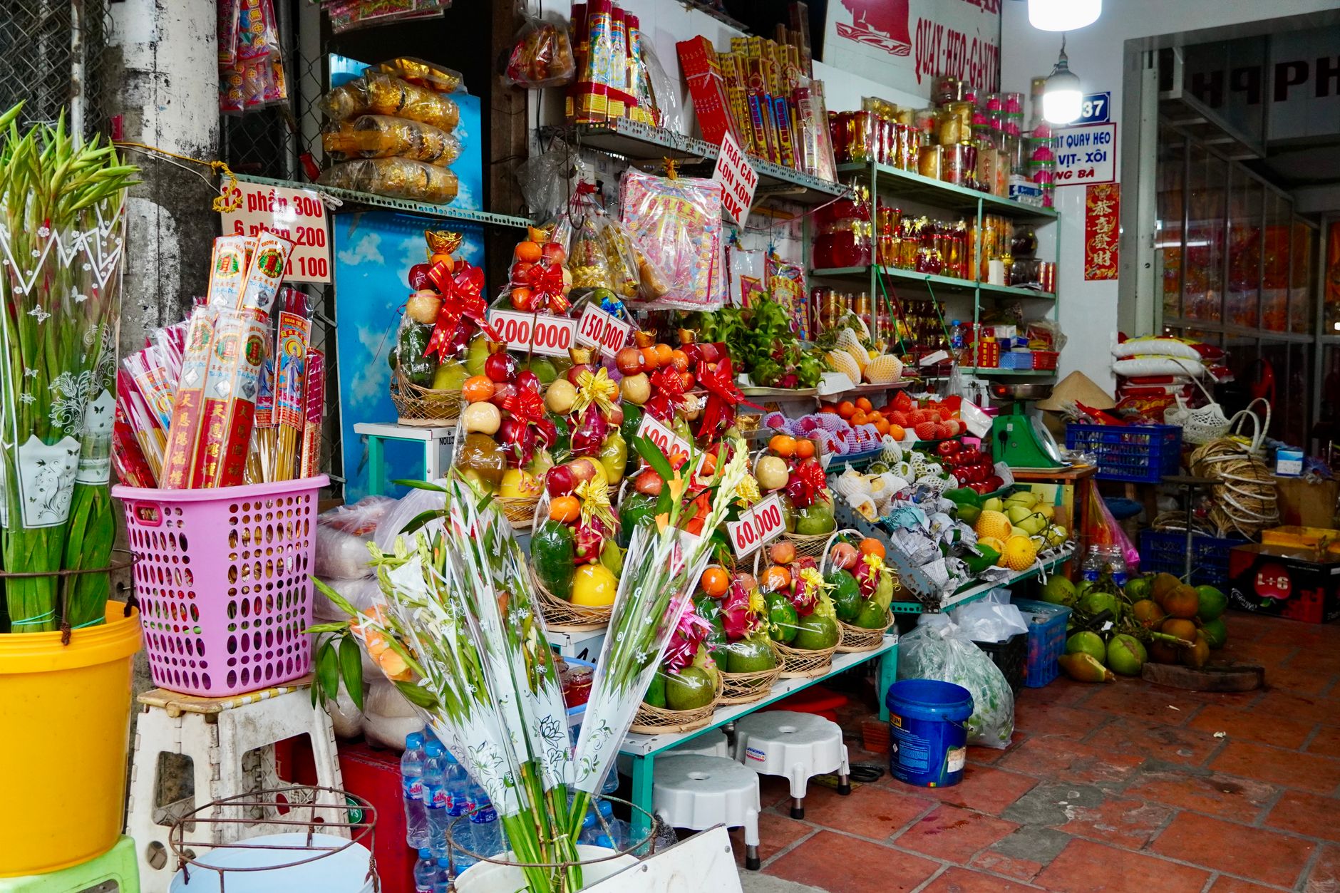 A vibrant market stall overflowing with an array of colorful, unusual fruits from around the world, suggesting a journey of culinary discovery.